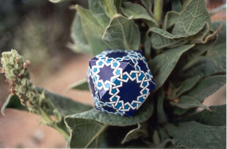 Cubeoctahedron with 9-pointed stars at the centers of the triangular faces, 12-pointed stars at the centers of the square faces, and 8-pointed stars at the vertices. 
